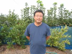 写真：久野果樹園の生産者